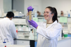 A chemistry student taking measurements