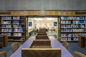 Wide shot of a reading room inside the Harold Cohen Library