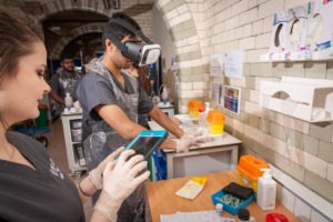 Students using virtual reality during a practical learning session at the School of Medicine