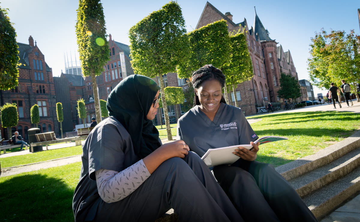 Two Medicine students studying on campus.