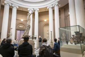 Students on a field trip to the Lady Lever Art Gallery taking part in a group discussion about the exhibitions